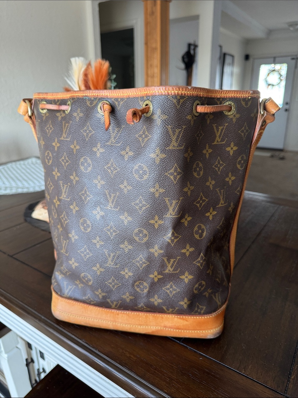 Louis Vuitton Monogram Drawstring Hobo in Brown and Tan